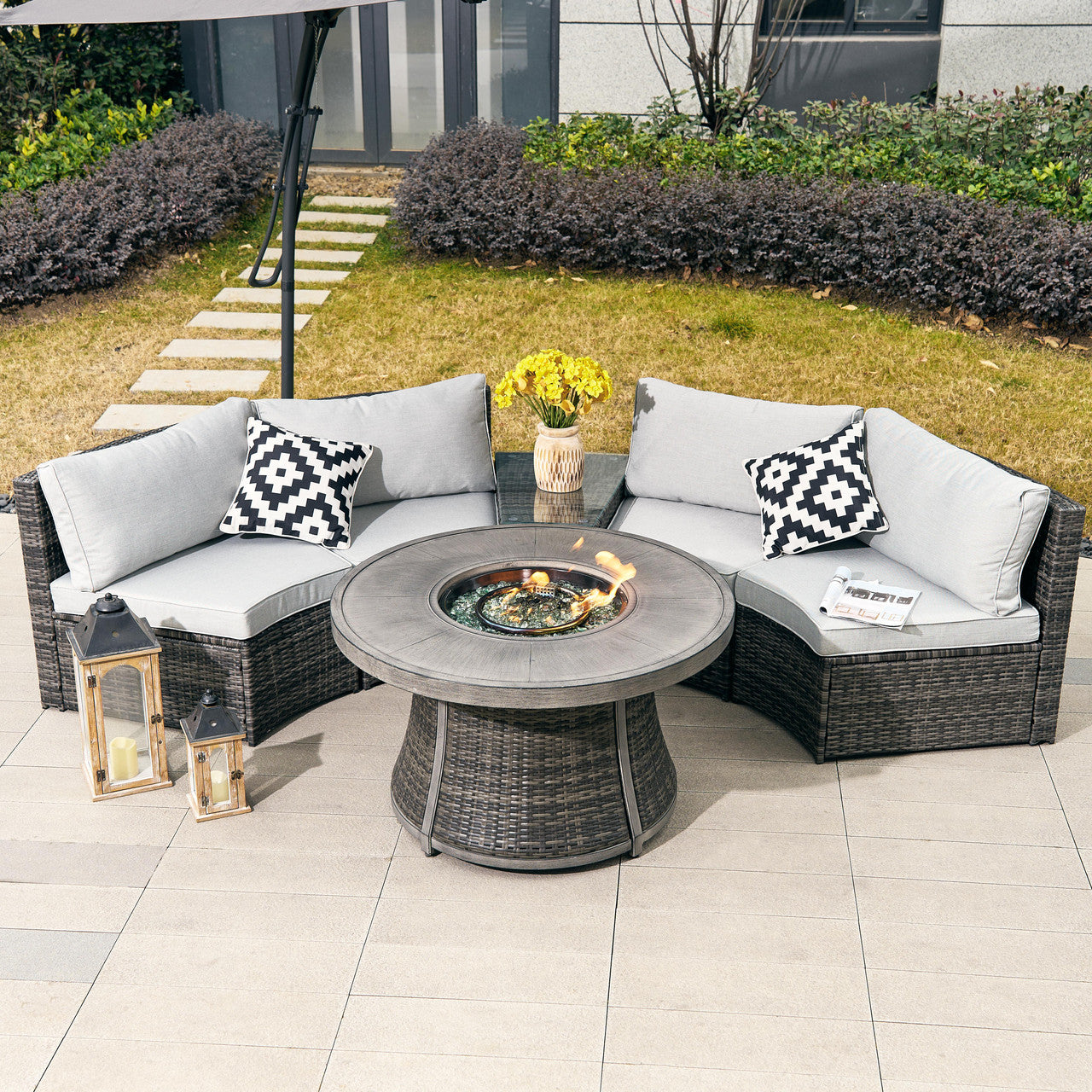 Stylish outdoor furniture set with a multi-functional fireplace table for year-round comfort.