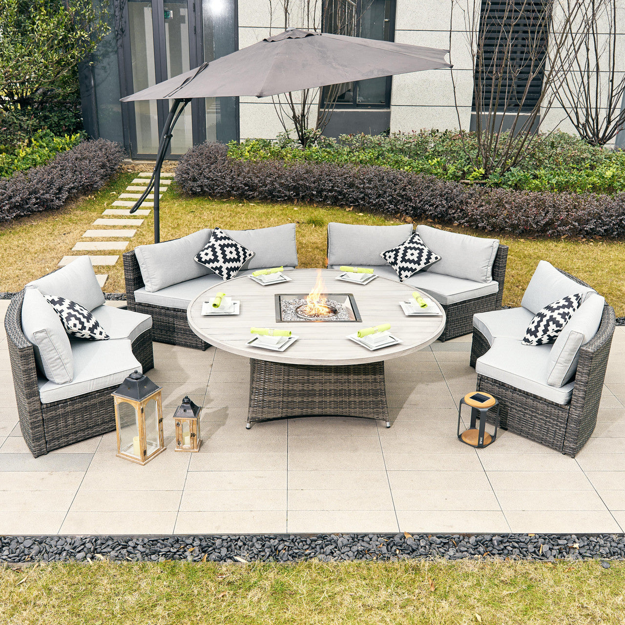A stylish and versatile 8-piece outdoor sofa set with a fire pit table, featuring a detachable design and weather-resistant rattan for ultimate comfort and functionality.