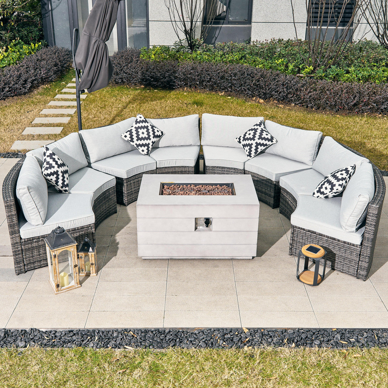 A stylish 8-seater sofa set with a fire pit table, perfect for outdoor comfort and gatherings.